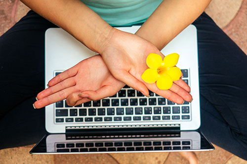 bigstock-Young-Woman-Freelancer-Meditat-325251106